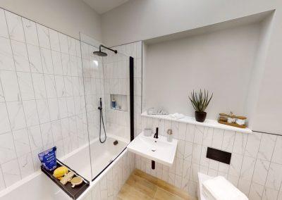 Bathroom within new build with white bathroom suite
