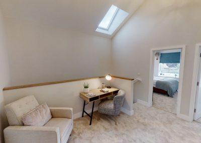 Loft room with modern single sofa chair and table