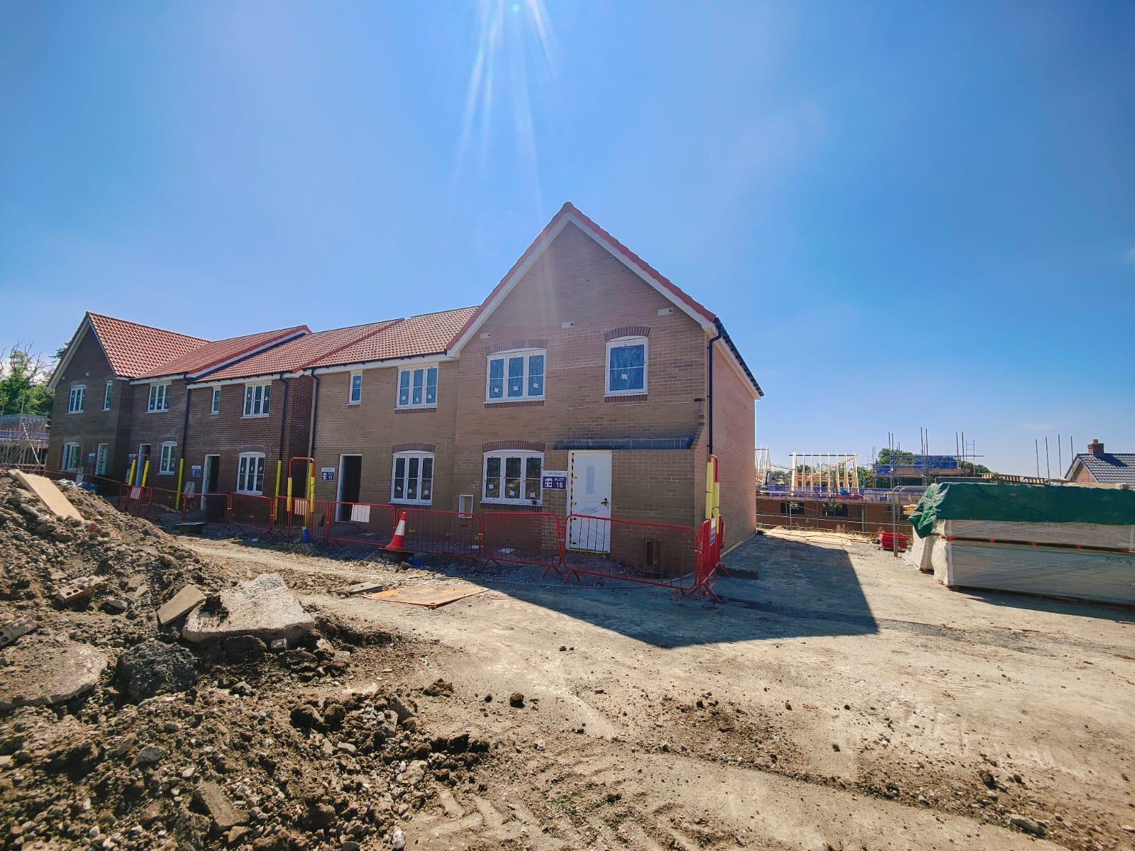 Construction site with new build houses during construction 