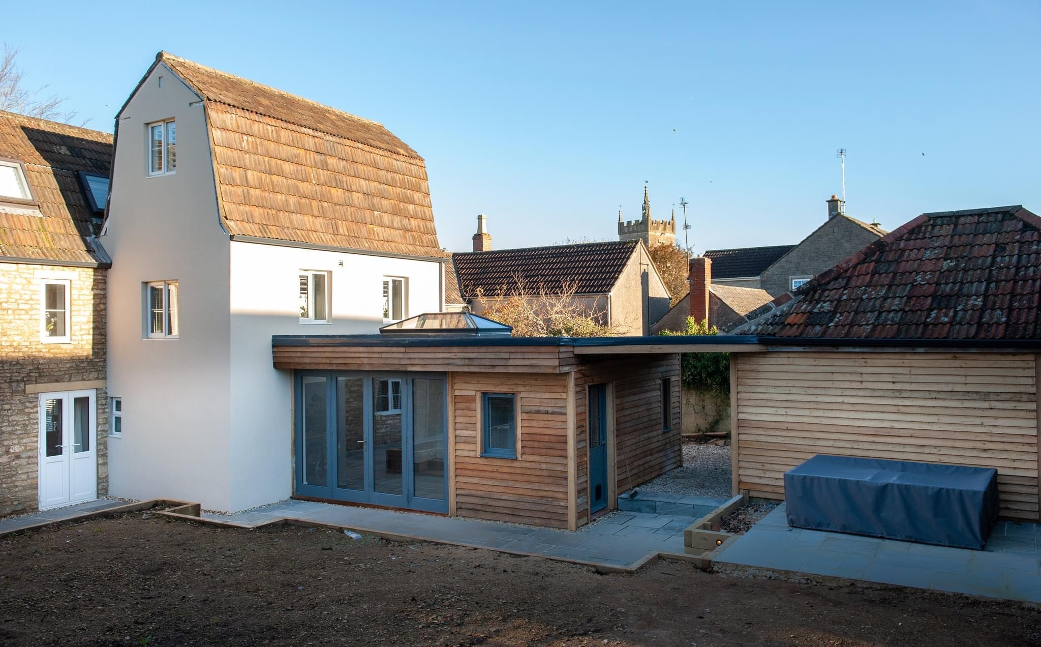 Exterior image of collection of buildings and relaxing outdoor space