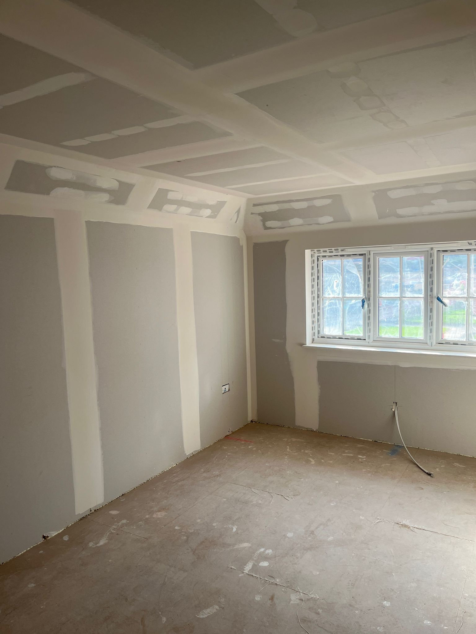 Drylining within a building