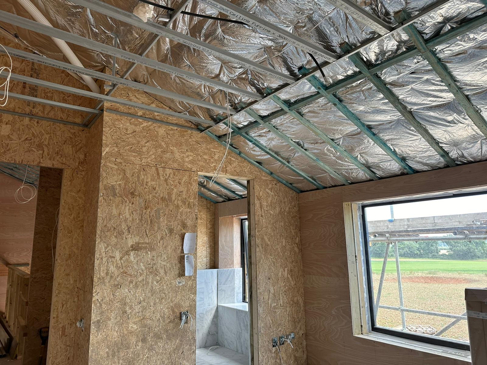 Insulation within roofline